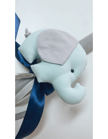 Handmade Easter candle with handmade elephant.