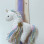 Handmade Easter candle with handmade unicorn