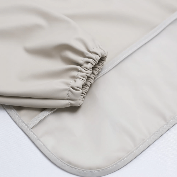 Πλαστικοποιημένη Σαλιάρα με Μανίκια - Εκρού - Trois Kilos Sept | 55-8085423