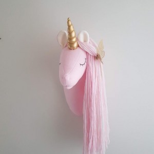 Unicorn with golden butterfly