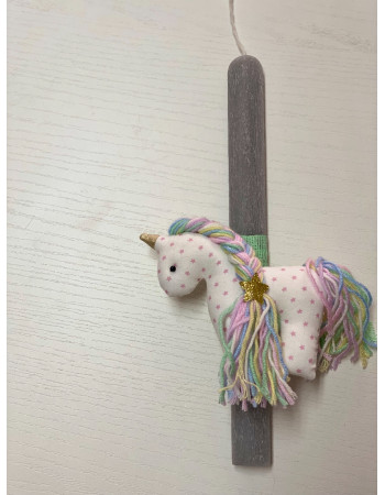 Handmade easter candle with handmade unicorn