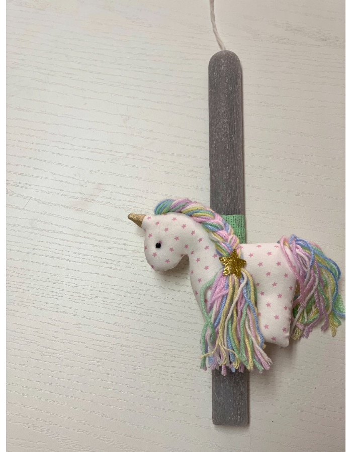 Handmade easter candle with handmade unicorn