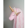 Unicorn with golden butterfly