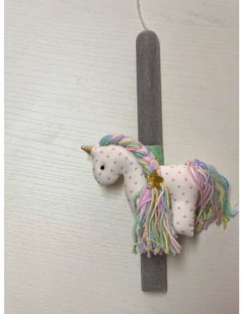 Handmade easter candle with handmade unicorn
