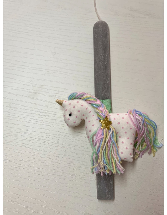 Handmade easter candle with handmade unicorn