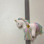 Handmade easter candle with handmade unicorn